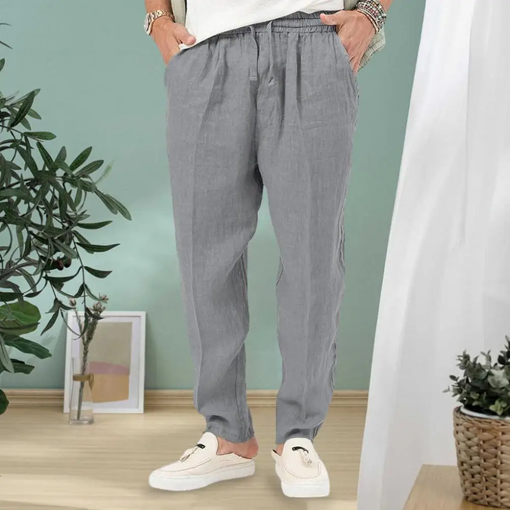 

Men Sports Pants Drawstring Elastic Waist Daily Trousers Loose Pockets Soft Style Pants Mid Waist Deep Crotch Men Long Trousers