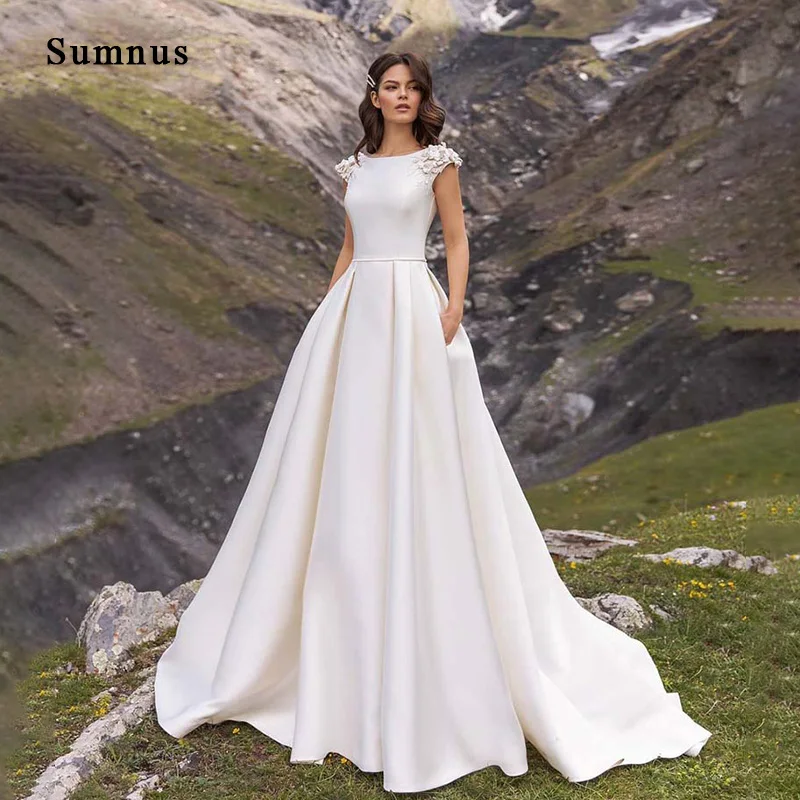 

Ivory Satin Wedding Dresses Appliques Cap Sleeve With Pocket A Line Bride Dress Pleats O Neck Princess Wedding Gowns Customize