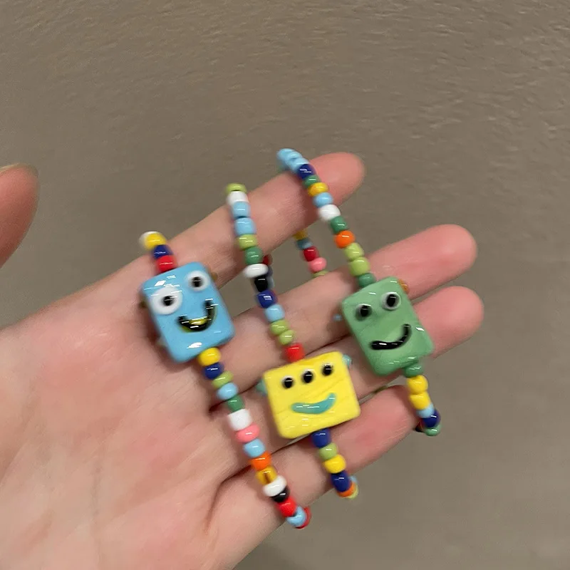 

Bohemia Cute Anime Face Bracelets Elastic Rainbow Beads Charm Bracelet For Kid Bracelet Girl Party Jewelry