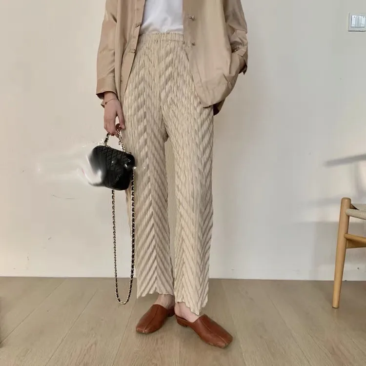 Spring and summer new Miyake pleated pants wave embossed trousers loose waist loose straight pants casual pants