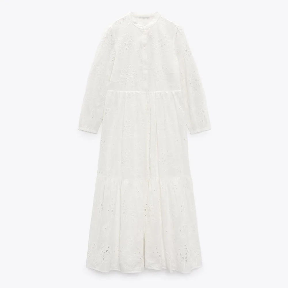 

DiYiG WOMAN2021 Spring/Summer New women's white hollow embroidered round neck button design sense youth long sleeve midi dress