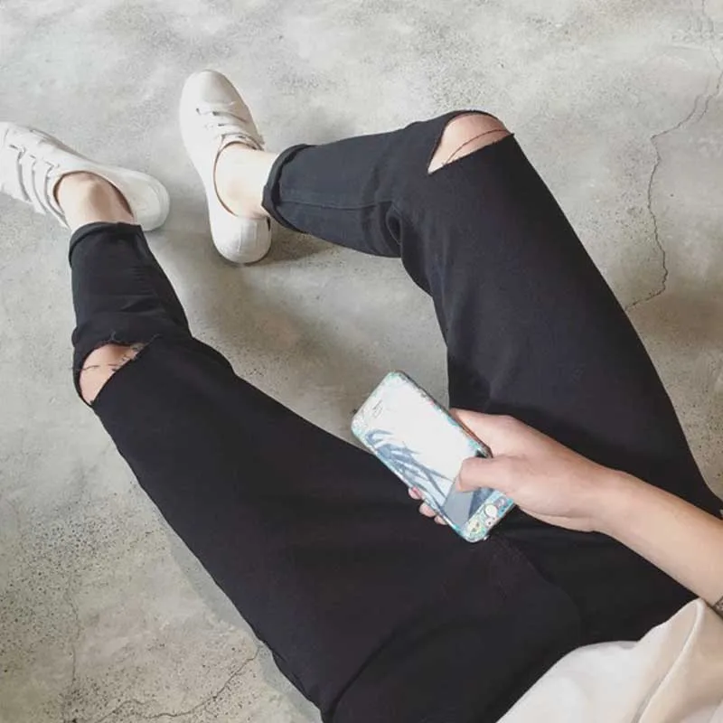 

Hot 2020 Summer Spring Fashion Korean black/blue streetwear denim jeans Harem men's Ripped cut hole pants feet youth solid color