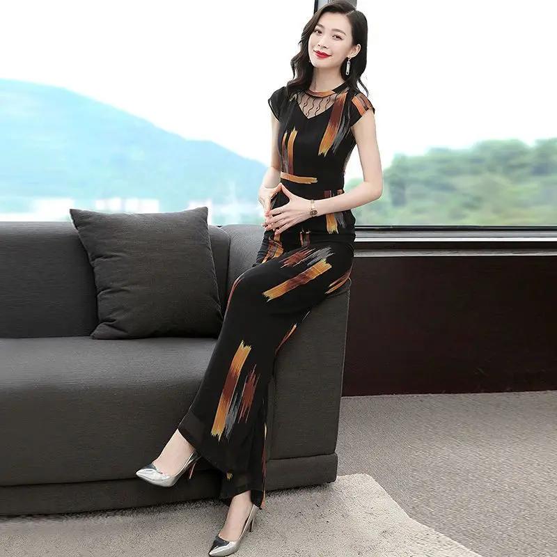 Женское боди с V-образным вырезом широкие брюки высокой талией и принтом