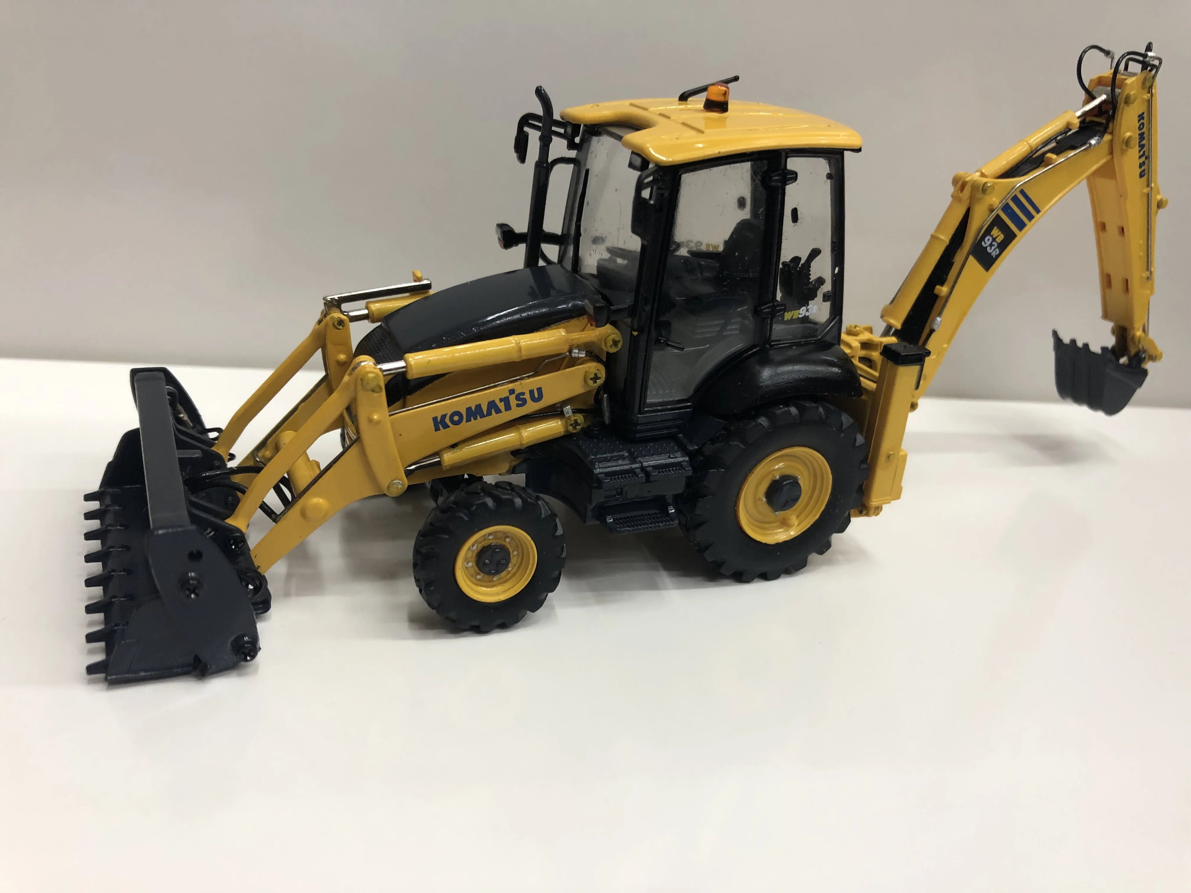 

Collectible Alloy Model 1:50 Scale Komatsu WB93R-8 Sliding Loader Excavator Construction Vehicles Diecast Toy Model UH8142