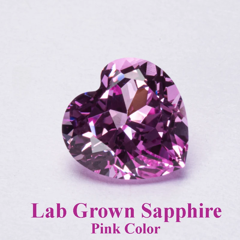 Выполненный в лаборатории сапфир форме сердца розового цвета очаровательные