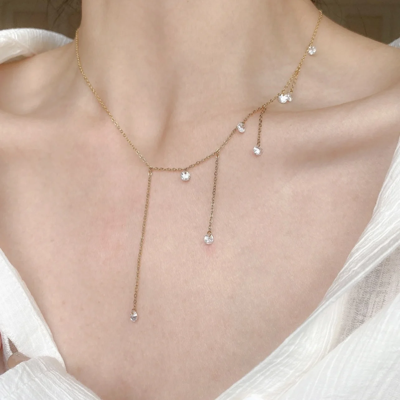 

2022 Beautiful Starlight Diamond Tassel Zircon Shiny Summer Necklace Clavicle Chain Sexy Titanium Steel Gold-plated Jewelry