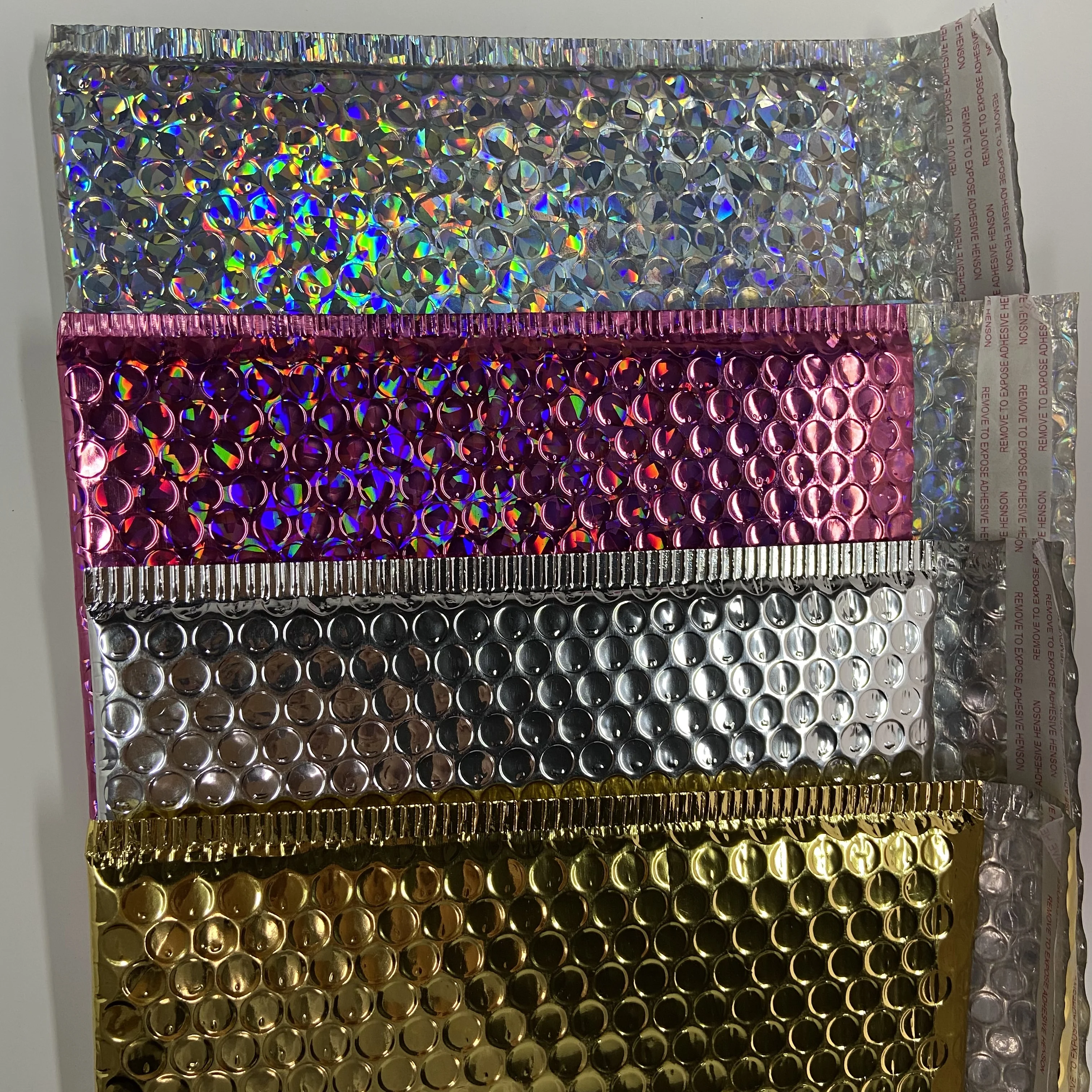 Tanie 30 Sztuk Holograficzny Metaliczny Bańka 4 Kolory Mailers Samoprzylepne Wyściełane Koperty Na Przesyłki Poduszki Koperty Kup 30 Sztuk Holograficzny Metaliczny Bańka 4 Kolory Mailers Samoprzylepne Wyściełane Koperty Na Przesyłki Poduszki Koperty
