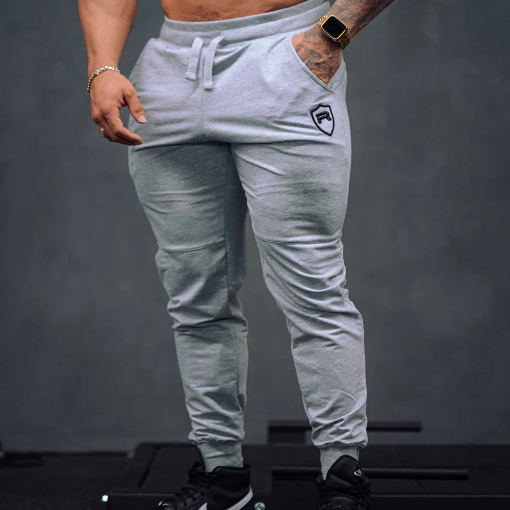 

New muscle fitness brother sports casual trousers men's autumn running equipment training squat beam mouth pants