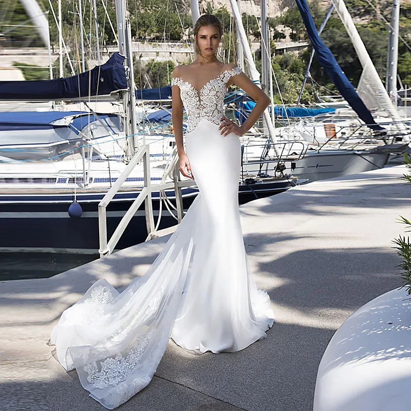 

Anna BeautyMermaid Beach Wedding Dresses 20022 Cap Sleeve O-Neck Appliqued Lace with Small Train Boho Bride Dress Free Shipping