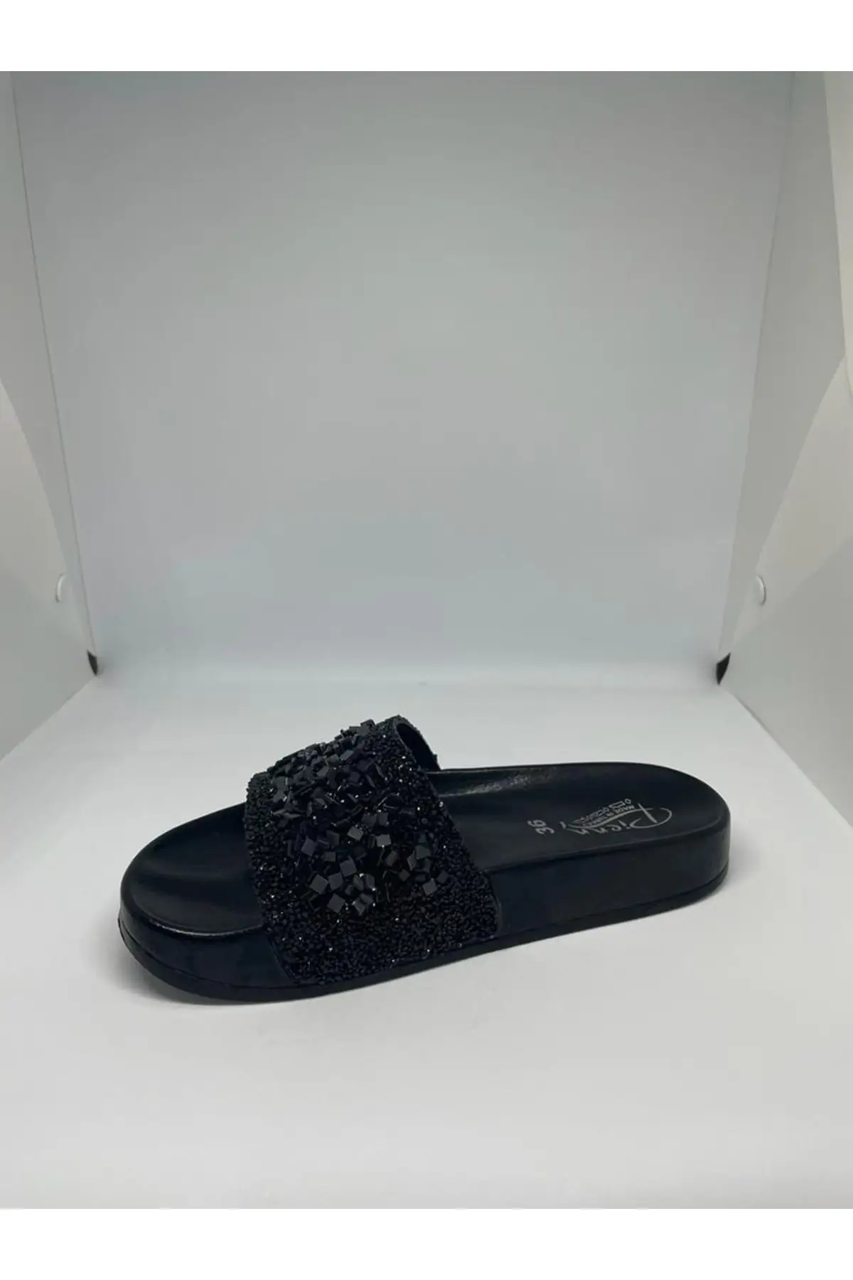 

Women's black stone slippers