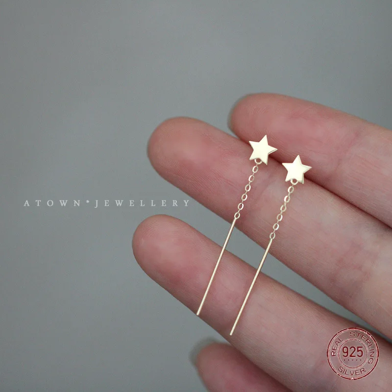 Женские серьги-подвески со звездами из серебра 925 пробы - Цена: 431