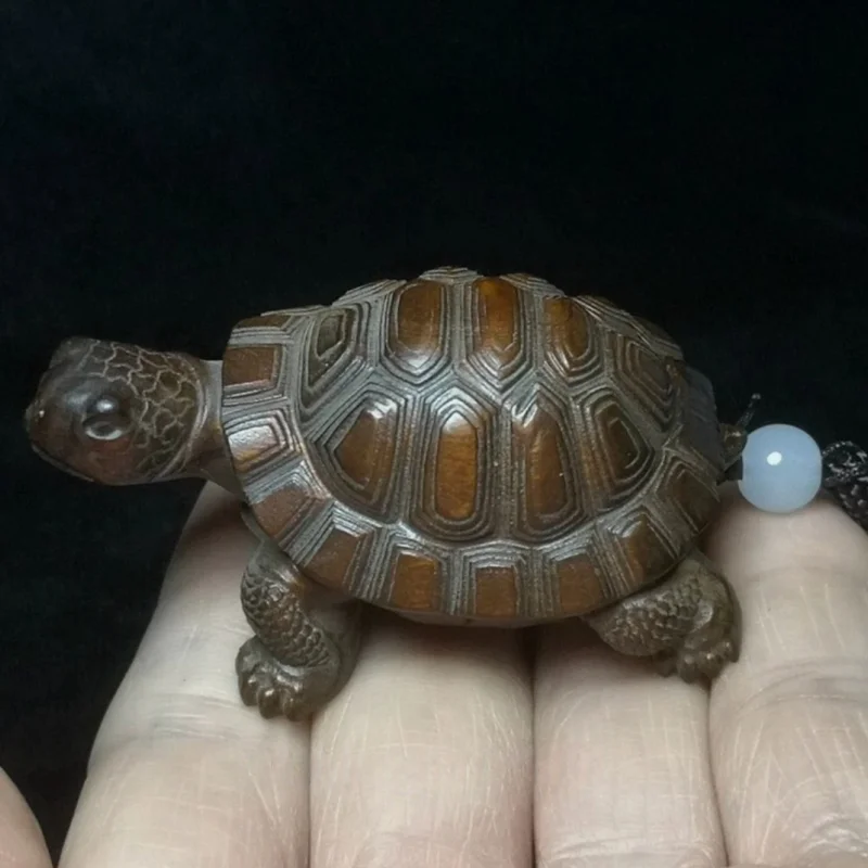 

Статуя черепахи из дерева