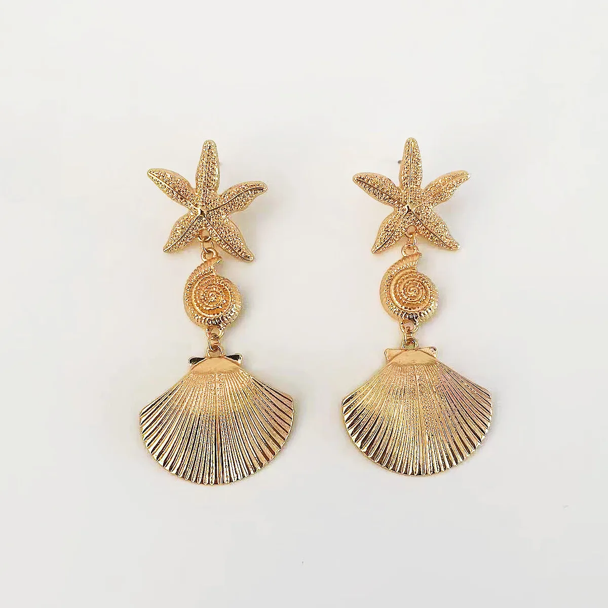 МОДНЫЕ ЮВЕЛИРНЫЕ ИЗДЕЛИЯ MITTO И ВЫСОКОЕ АКСЕССУАРЫ С ЗВЕЗДНЫМИ РАКУШКАМИ АССОРТИ