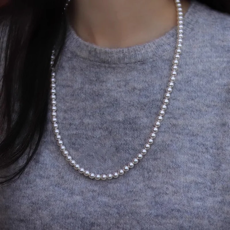 s925Серебряный круг Shijia Pearl Yuanbao Knot60cmОдлиненное ожерелье Женское модное