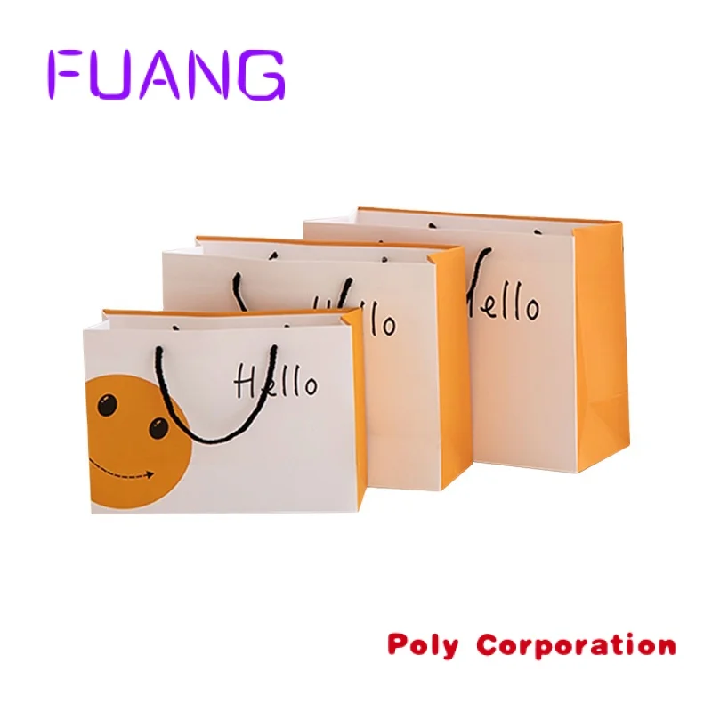 China Manufacturer Ecofriendly Smiley Design Children Gift Bag Custom Logo Promotional Shopping Packing Paper Bags