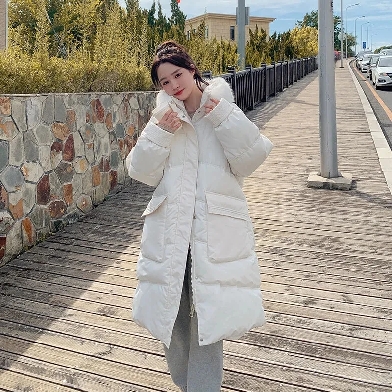 Женская длинная стеганая куртка с меховым воротником и капюшоном теплая зимняя