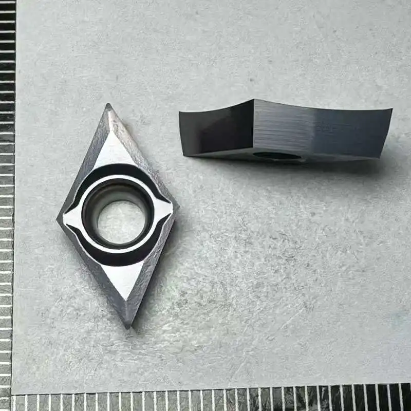 

DCGT070201 DCGT070202 DCGT070204 DCGT11T301 DCGT11T302 DCGT11T304 DL1 Твердосплавная вставка Токарные инструменты с ЧПУ Токарные станки