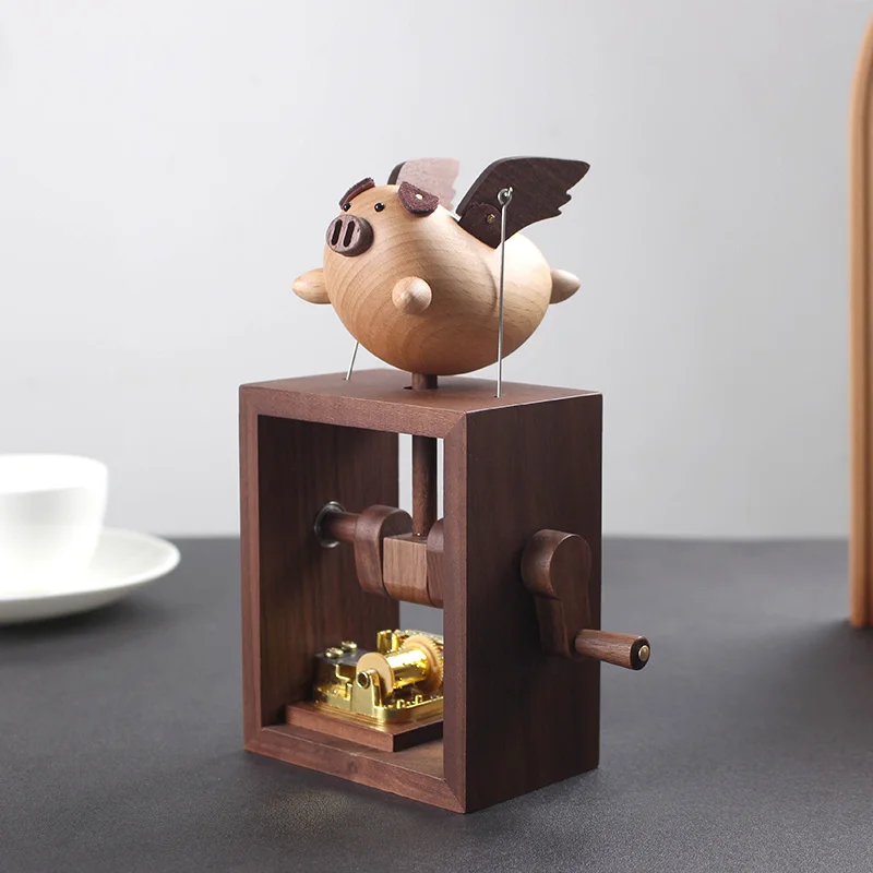 

Wood Carving Flying Pig Music Box Home Decoration Hand Rocking Statue Ornament Creative Valentine's Day Christmas Birthday Gift