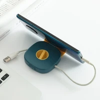 portable cute square shaped rotating clip headset data cable organizer storage box desktop winder mobile phone holder stand
