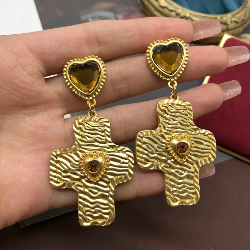 

Cross-Shaped Love Gem Silver Stud Earrings