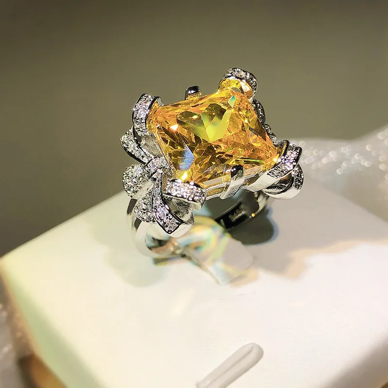 

Модный изысканный комплект высокой температуры Paraiba, квадратное четырехзубчатое желтое циркониевое кольцо, женское ювелирное изделие для ...