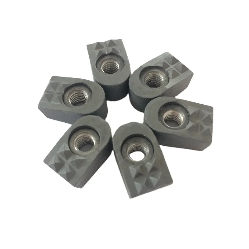 

Gripper insert of powder tungsten steel alloy