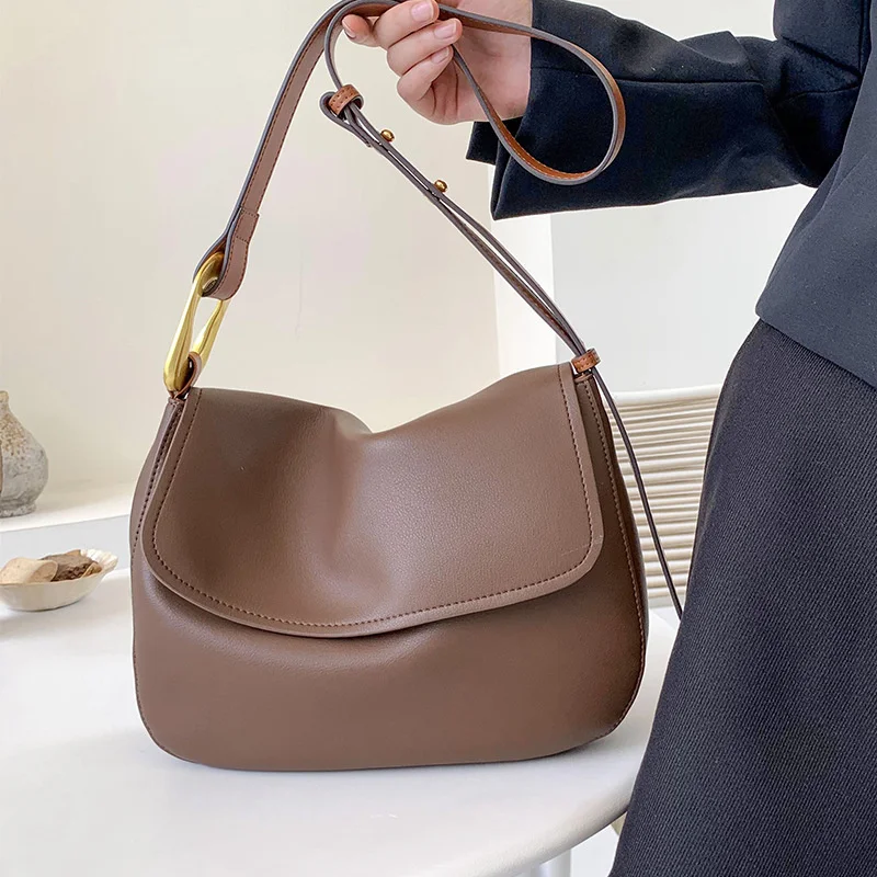 

Сумка-тоут женская из натуральной кожи, брендовый вместительный саквояж на одно плечо с косыми лямками из воловьей кожи, 2023