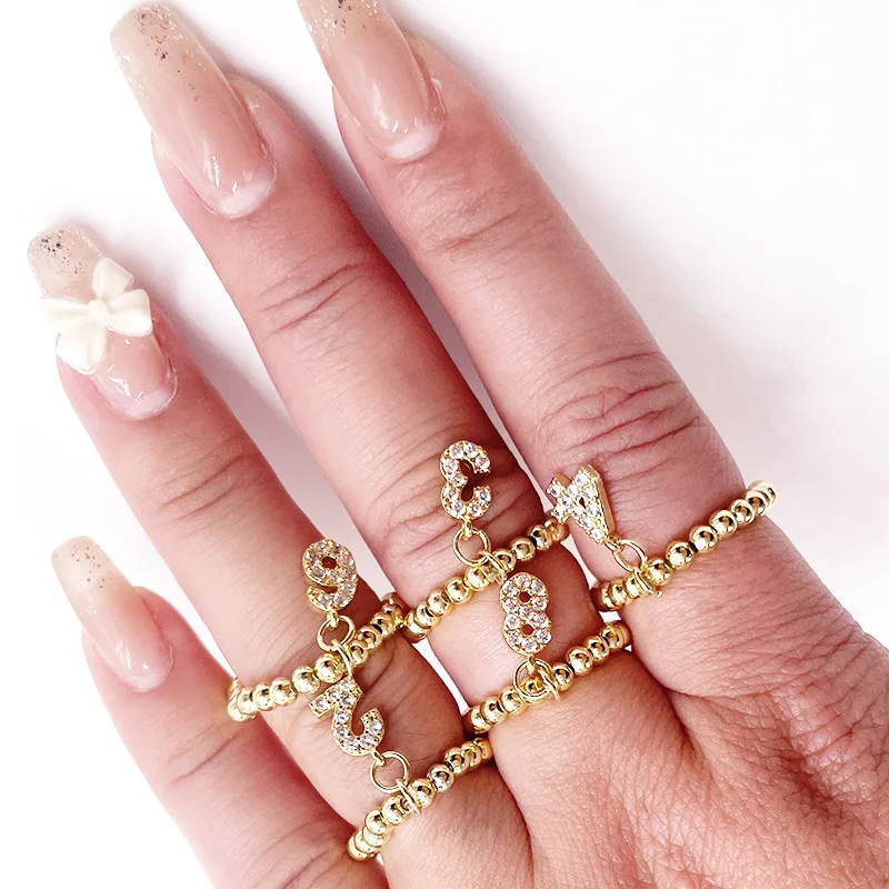 

2022 New Fashion Women Elegant Zircon Inlaid Arabic Numerals 0-9 Pendant Adjustable Beads Ring Women Simple Party Finger Ring