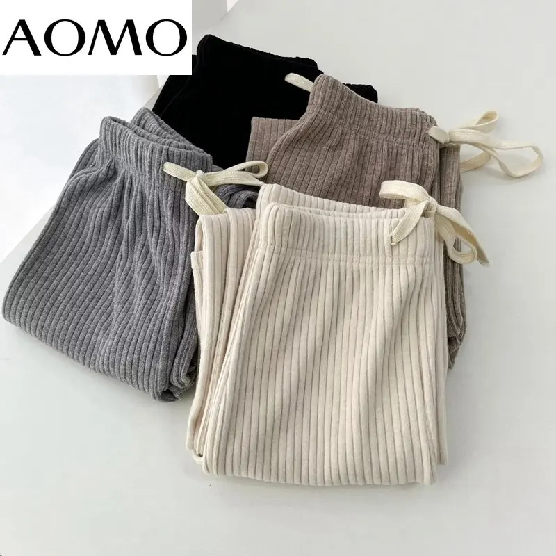 

Брюки-карго женские трикотажные с широкими штанинами и поясом