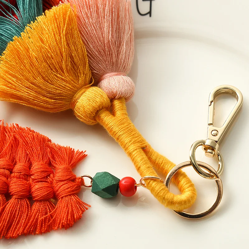 

Women's European and American key chain creative cotton thread tassel pendant leaf wood bead key chain bag Pendant Jewelry Gift