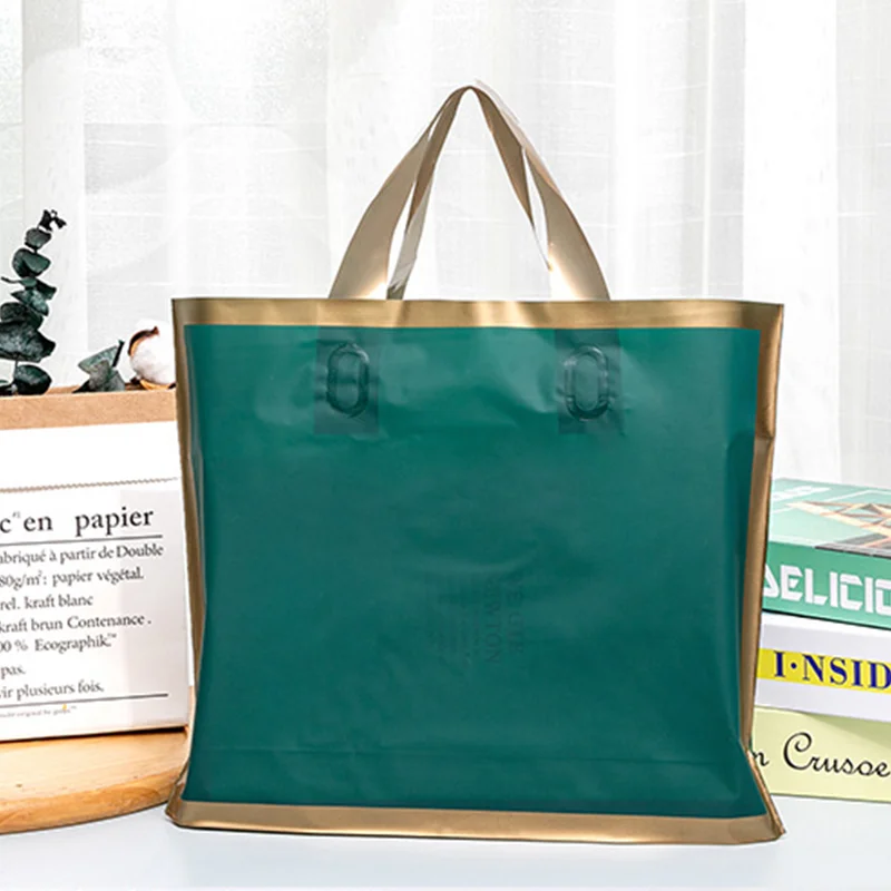 Фото 30/50/100 pieces customized logo shopping bags with handles plastic gift bags wedding party clothing store event packaging bags №4