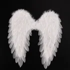 Черно-белые крылья Ангела пера Праздничная фотография оформление подиума демон дьявол крыло показать Пасху