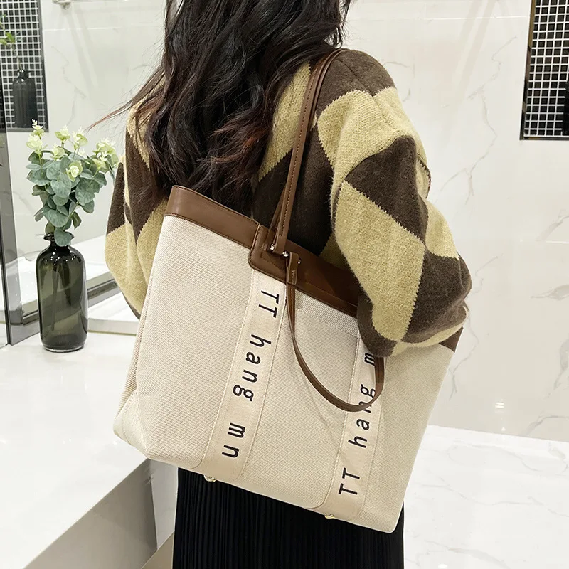 

2023 Spring and summer new niche design simple one-shoulder Tote bag large capacity commuting canvas bag fashion handbag W897