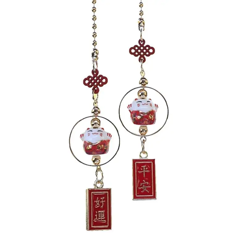 

Подвеска-зеркало заднего вида в виде кошки