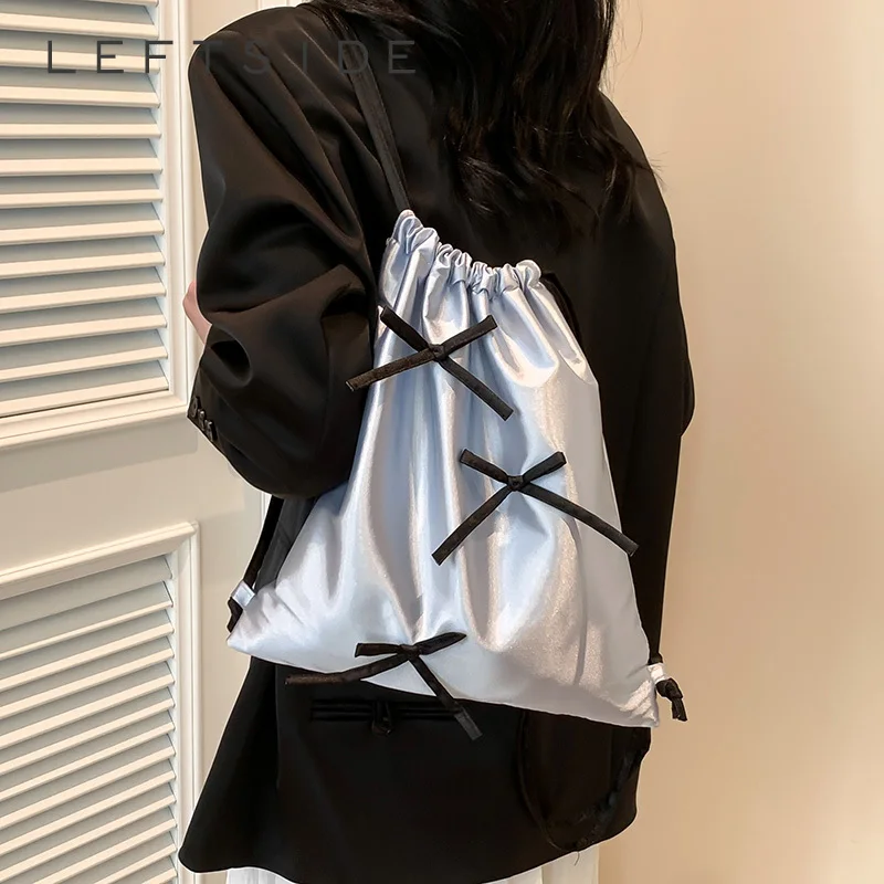 Женский однотонный рюкзак на шнурке с бантом черный/коричневый/бежевый