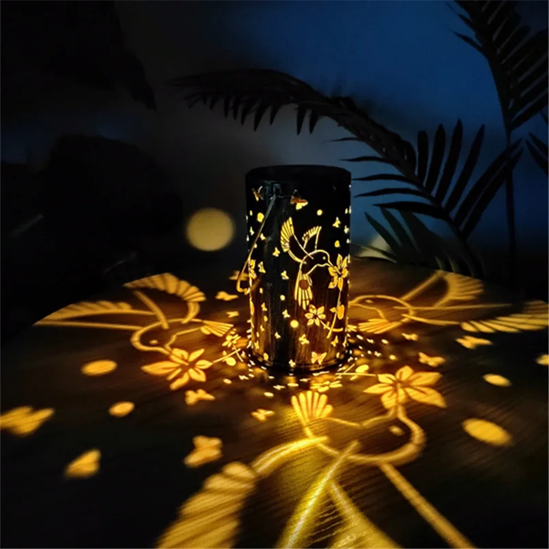 

Solar Hummingbird Butterfly Projection Lamp, Wrought Iron Hollow Villa Garden Lantern, Can Be Hung In The Ground.