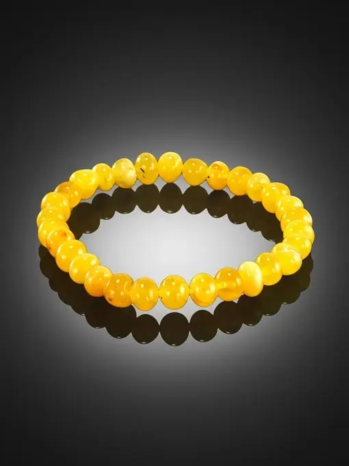 Браслет из натурального балтийского янтаря медового цвета Галька мелкая