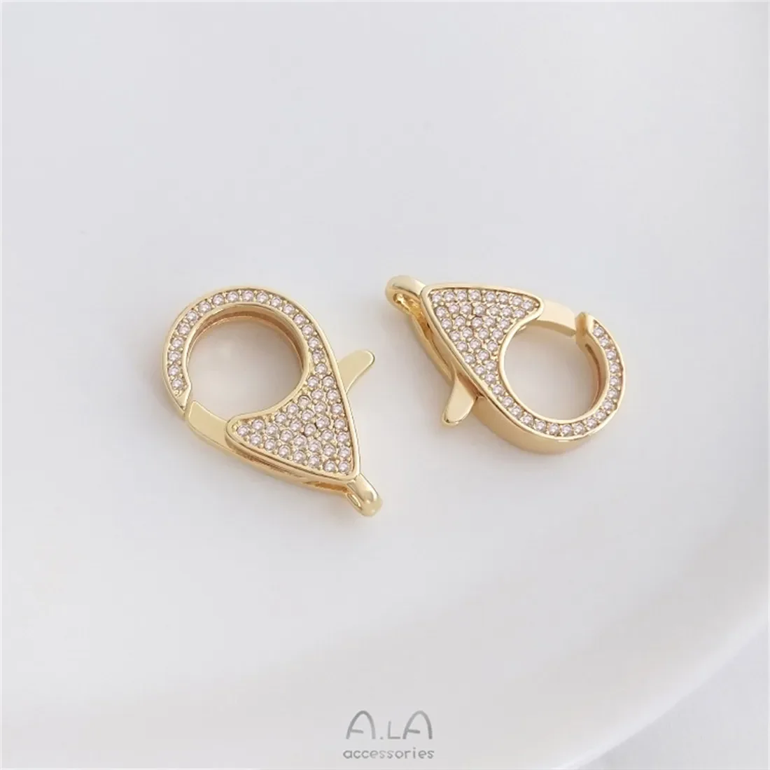 Пружинная пряжка с микроинкрустацией цирконом 14-каратное золото пятиконечная