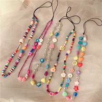 new ins creative bohemian mobile phone lanyard soft pottery smiling face pearl string acrylic anti loss mobile phone chain