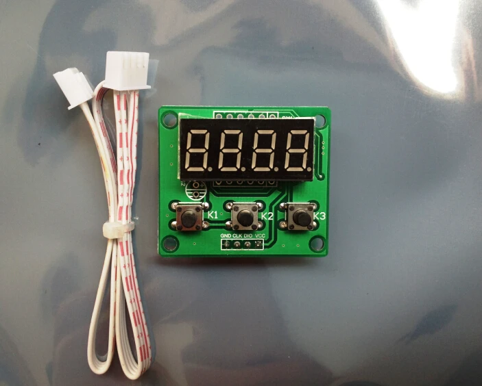 Tm1650. Tm1650 Arduino. Микросхема tm1650. Часы на tm1650.