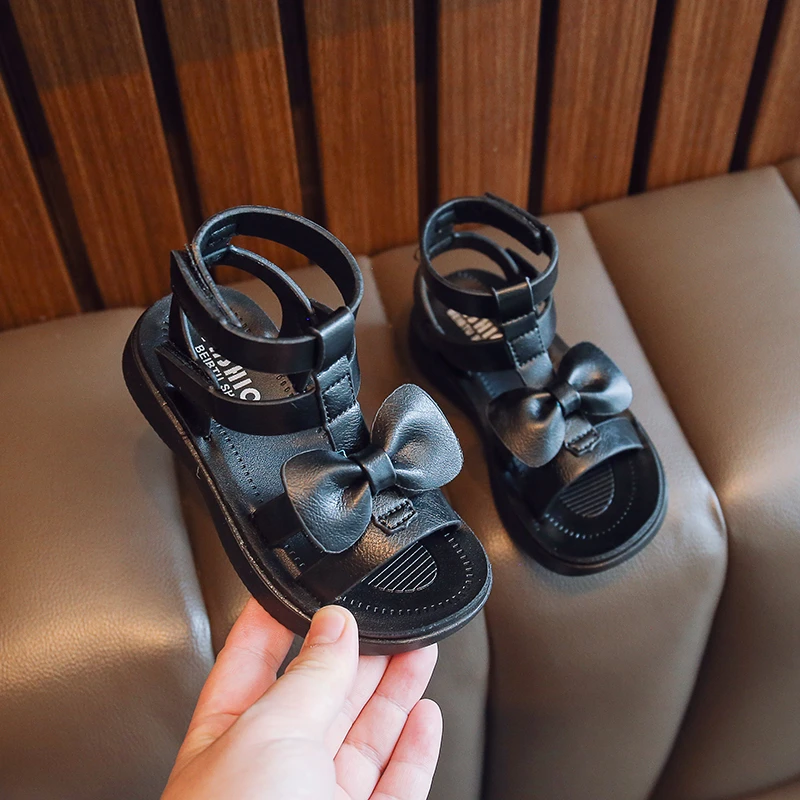 

Black Simple Bow Hollow Children Roman Sandals Sweet Girl Flat Bottom Fashionable 2022 Summer New Hook & Loop Kids Casual Shoes