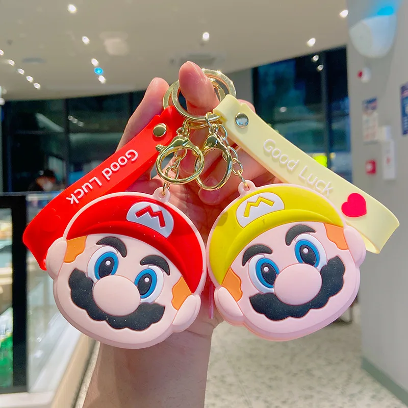 

Super Mario Bros Cartoon Keychain Silicone Coin Purse Anime Luigi Bowser Yoshi Wario Dolls Mini Storage Bag Ornaments Kids Gifts