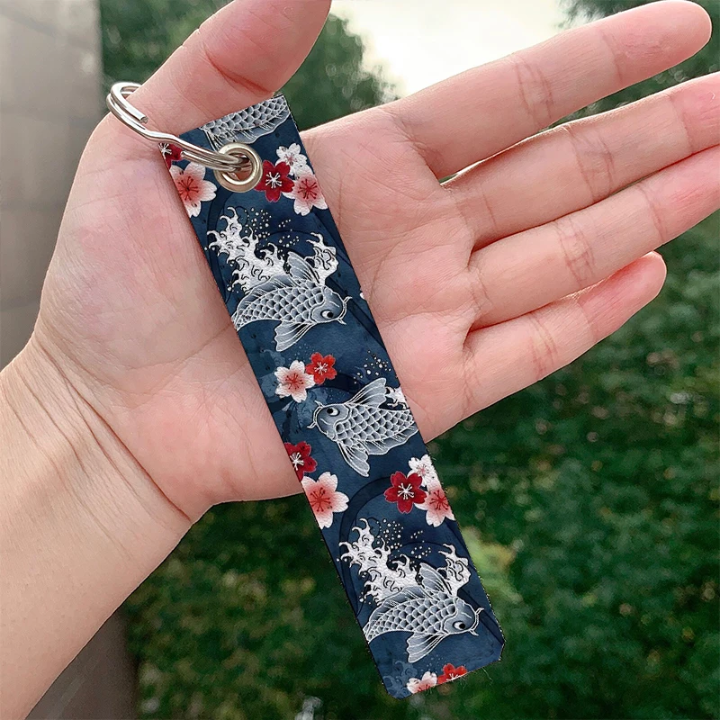 

Koi sakura blossom in blue Leather Keychain Strap Keyrings Hanging Holder Bag Car Wallet Trinket Keychain Hanging Decoration