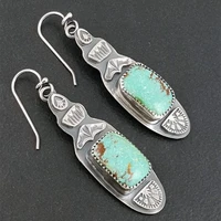 bohemian carved pattern turquoise earrings are beautiful and atmospheric and metal womens earrings are gifts and jewelry