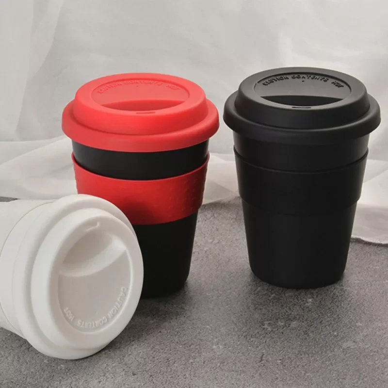 

2022New New 400ml Reusable Heat Insulated Ceramic Travel Mugs Tea Coffee Travel Mug Cup with Non-slip Sleeve and Silicone Lid