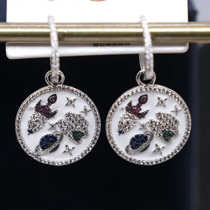 

Jewelry fashion new European and American hand-inlaid zircon space rocket star universe round earrings