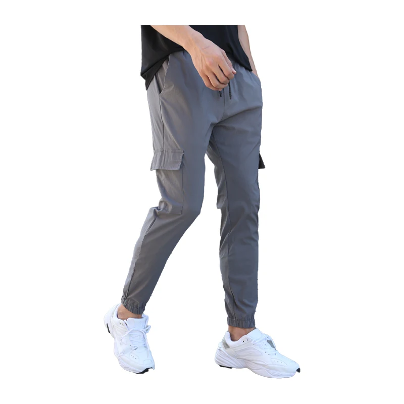 

Брюки-карго мужские спортивные, тонкие повседневные спортивные штаны для фитнеса в стиле хип-хоп, с боковыми карманами, модные брендовые Дж...
