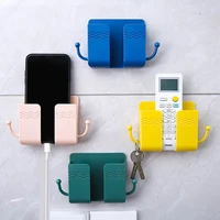 wall mounted organizer tv air conditioning remote control storage box mobile phone charging stand adhesive phone plug holder
