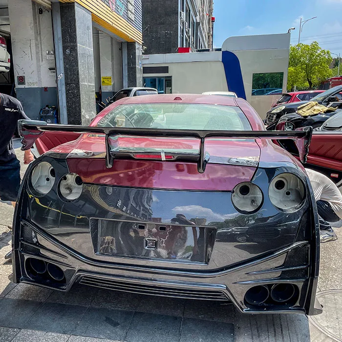 Новый комплект обвесов CUBE Car из углеродного волокна с глянцевым покрытием (карбоновый черный) для Nissan GTR: модифицированные переднийзадний бамперы, накладки на пороги, спойлер (art.: 3920dbed87233) - 3920dbed87233