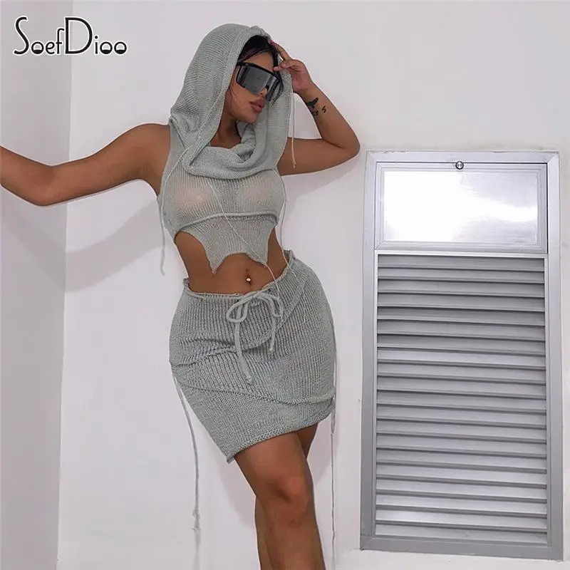 

Soefdioo Crochet Knitted Two Piece Set Women Sexy Hooded Irregular Crop Top and Bodycon Mini Skirt Match 2023 Casual Streetwear